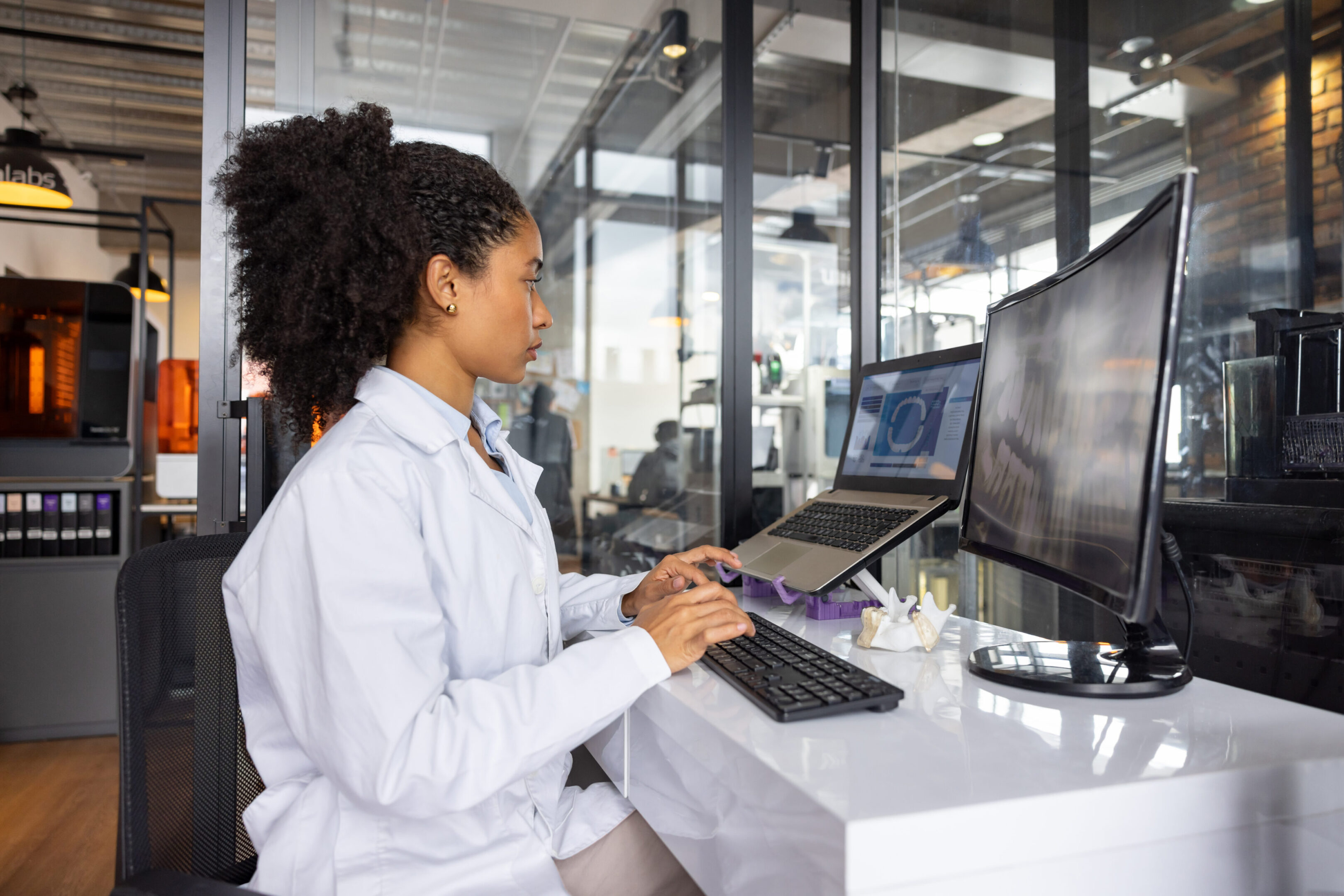 Health engineer working at a 3D printing laboratory